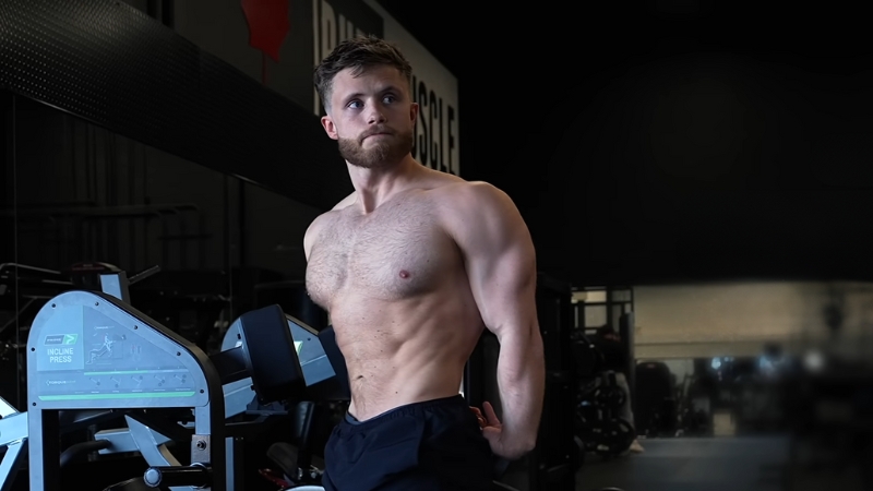 Man Posing in A Gym, Showcasing a Lean and Muscular Physique